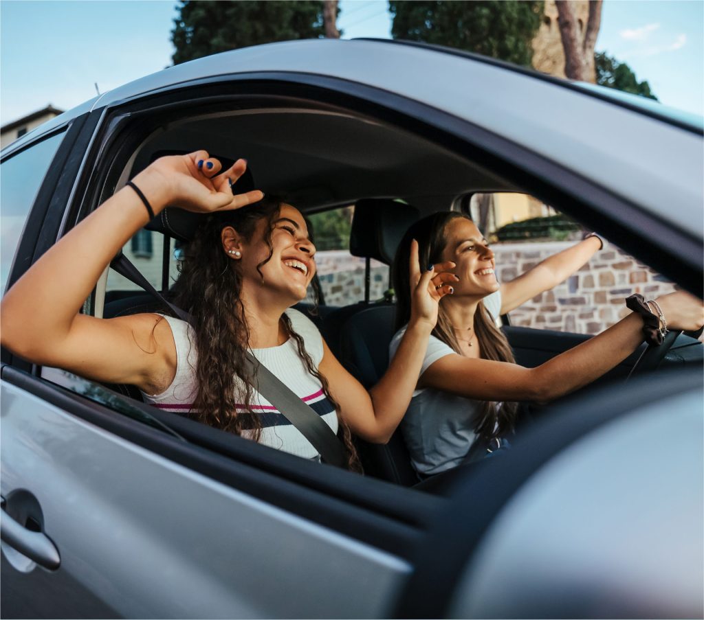 Easy Cars Corfu Car Rentals picture of happy girls enjoying their road trip