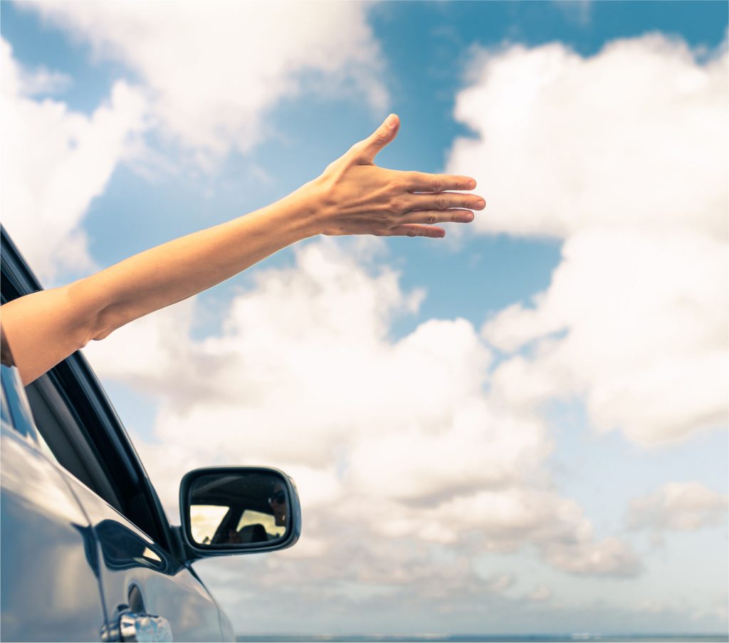 Easy Cars Corfu Car Rentals picture of girl with her hand outside the car window